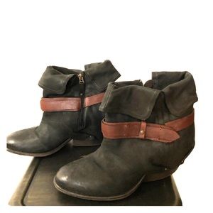 Black leather boots/booties.